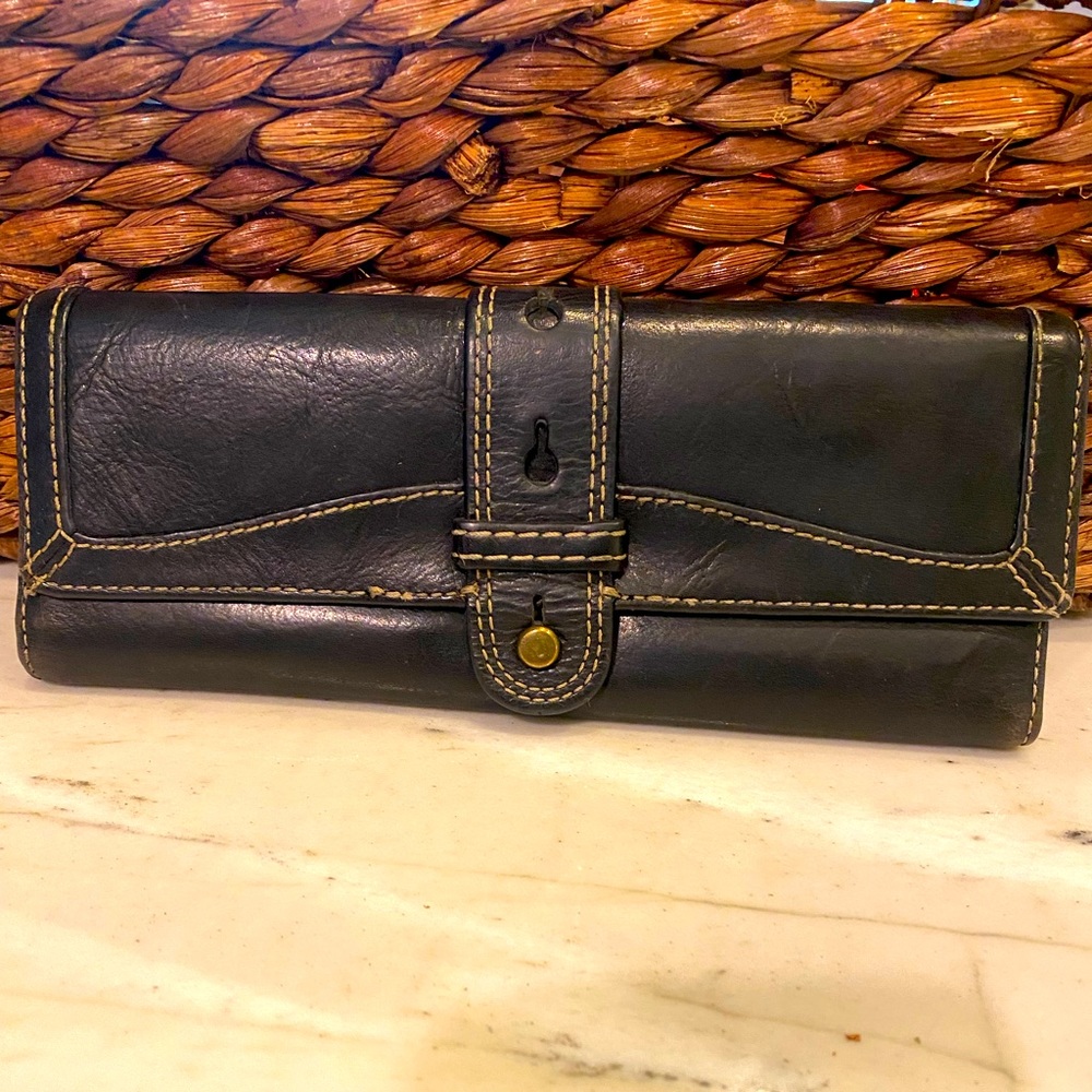 Large vintage fossil fifty -four wallet. 9in w x 4in